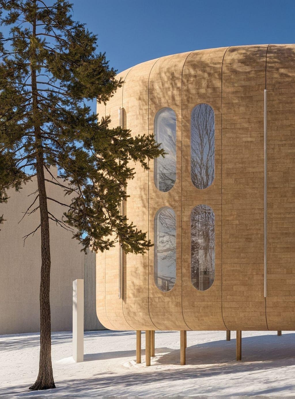 Exterior view of the ICON Vital House structure in a snowy landscape